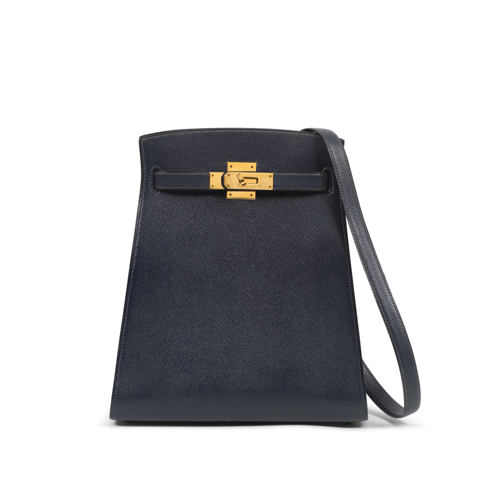 Hermès: a Bleu Marine Courchevel Leather Kelly Sport 24