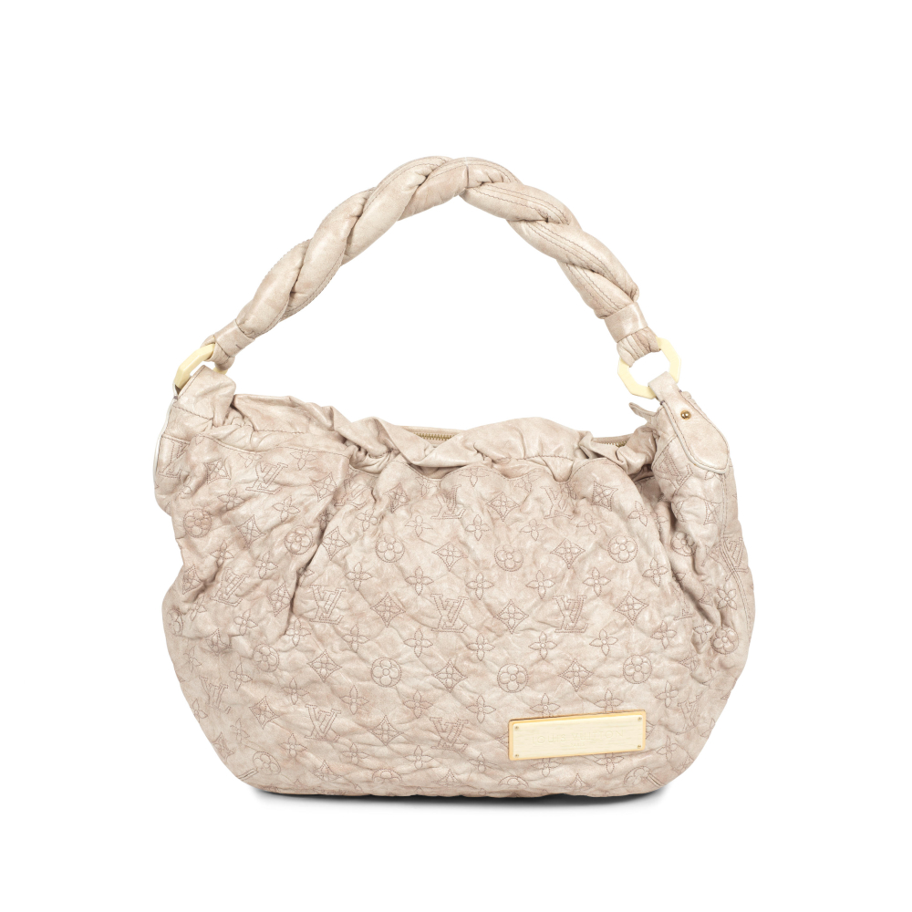 Louis Vuitton: an Ecru Olympe Nimbus GM