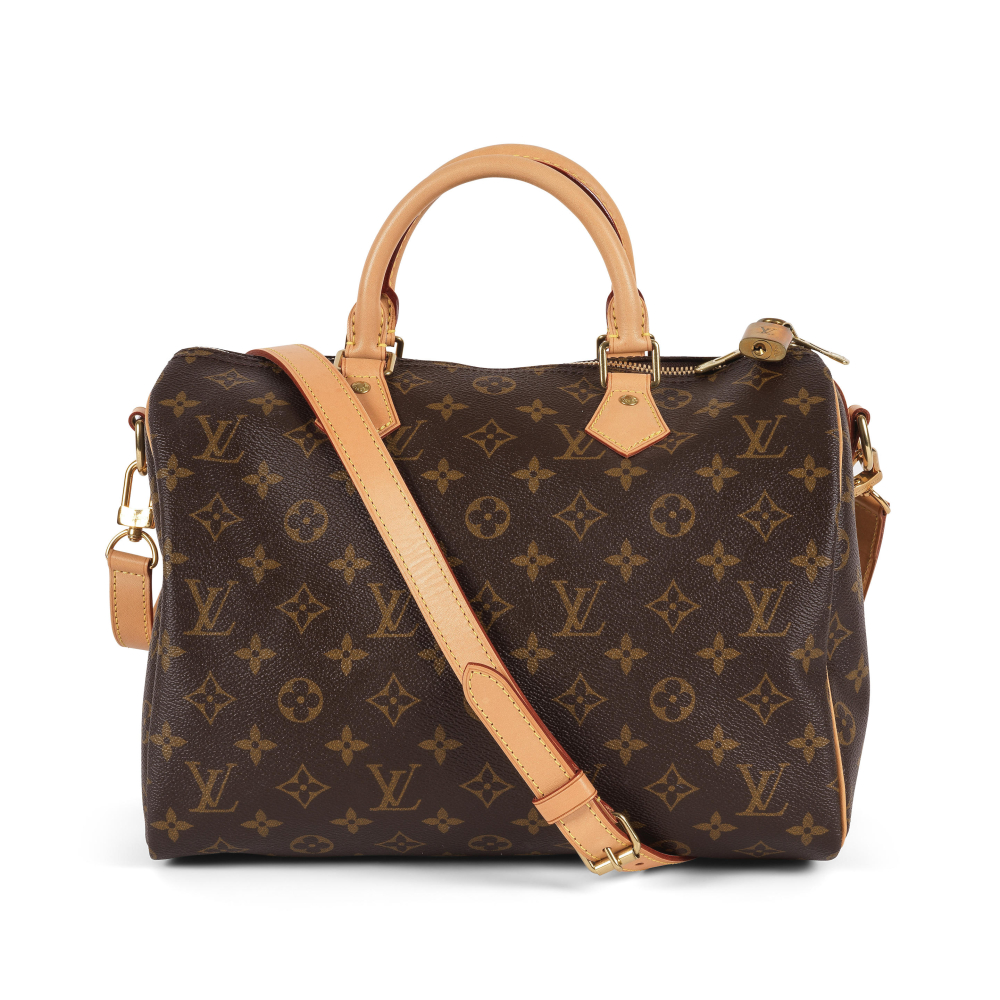 Louis VUITTON. Sac Speedy en toile Monogram et cuir naturel.