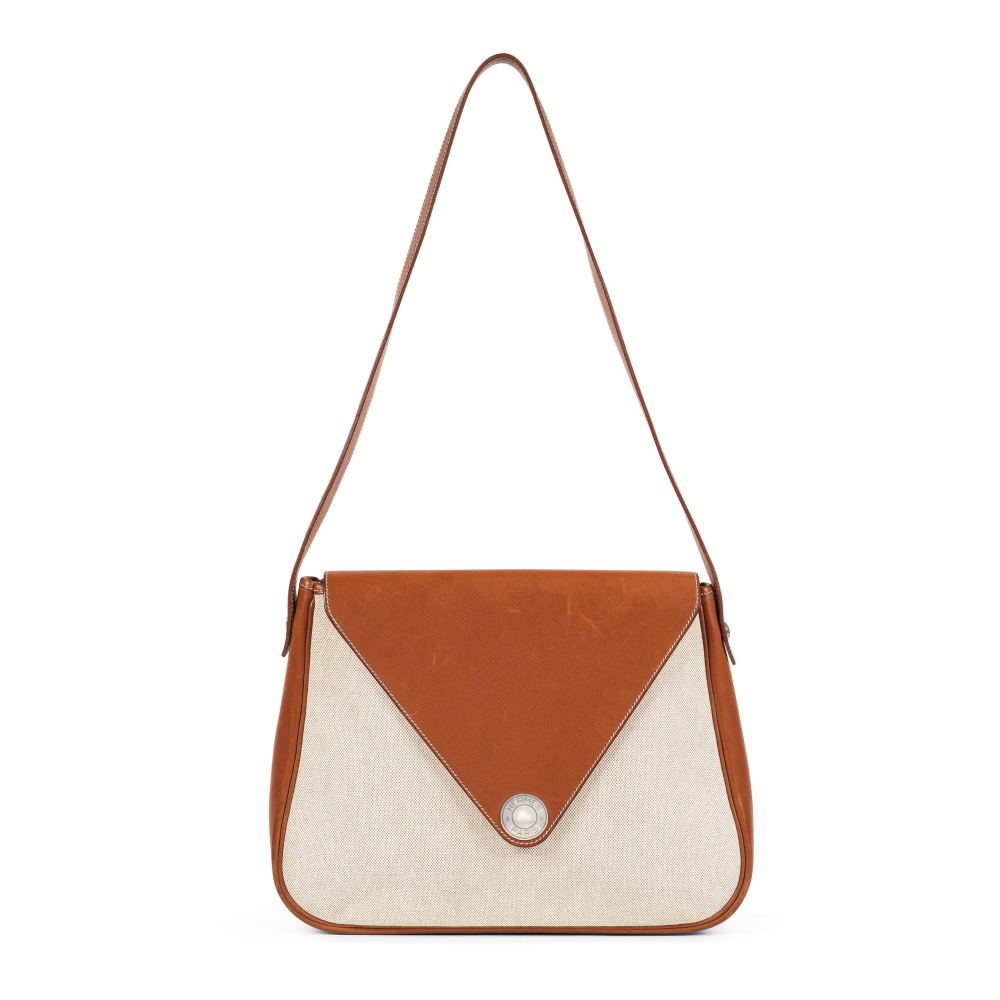 HERMES Paris. Sac Christine en toile chinée beige et cuir Barenia.