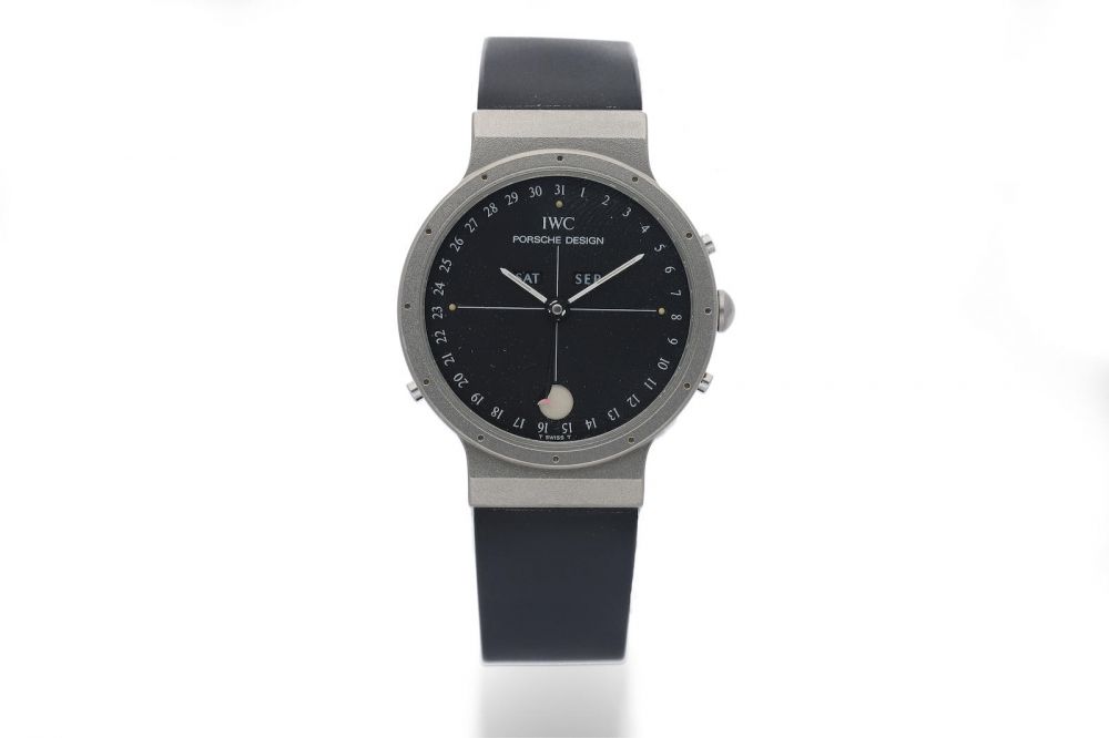 IWC for Porsche Design. A Titanium Triple Calendar Wristwatch with Moon-Phases