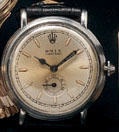 Rolex. A stainless steel automatic wristwatch