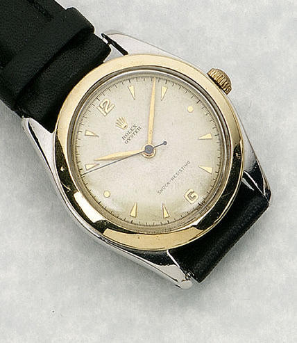 Rolex. A stainless steel and gilt mounted automatic centre seconds wristwatch