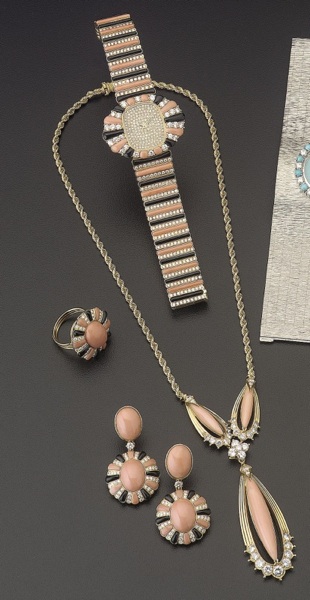 Patek Philippe. A fine 18ct gold onyx, coral and diamond set wristwatch together with matching necklace, earrings and ring