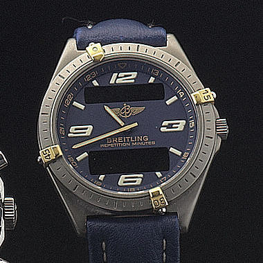 Breitling. A titanium analog and LCD digital display wristwatch