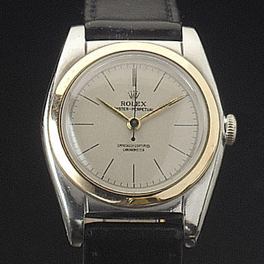 Rolex. A steel and gold automatic centre seconds wristwatch