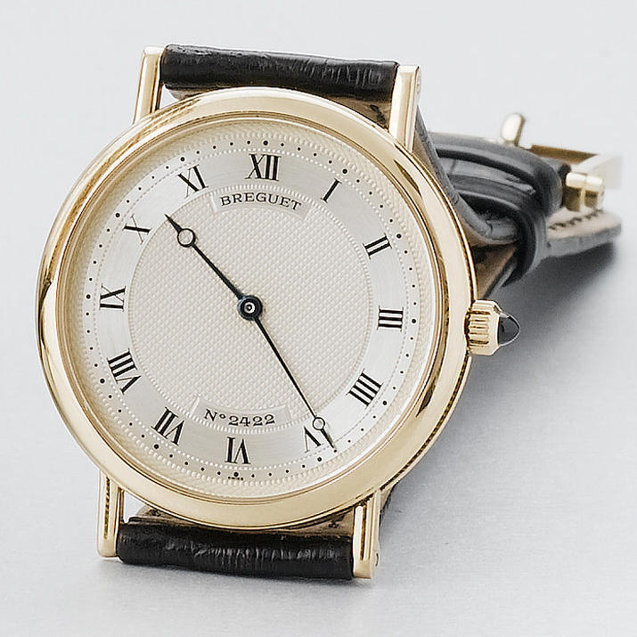 Breguet. A gold self-winding wristwatch