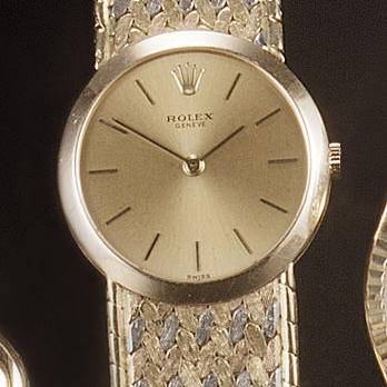 Rolex. A lady's 18ct three colour gold bracelet watch
