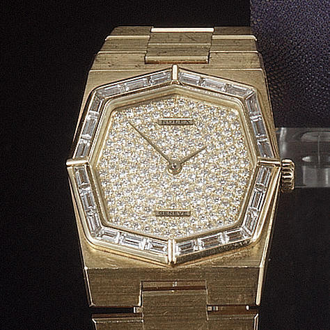 Rolex. A mid size 18ct gold bracelet watch with diamond set bezel and dial