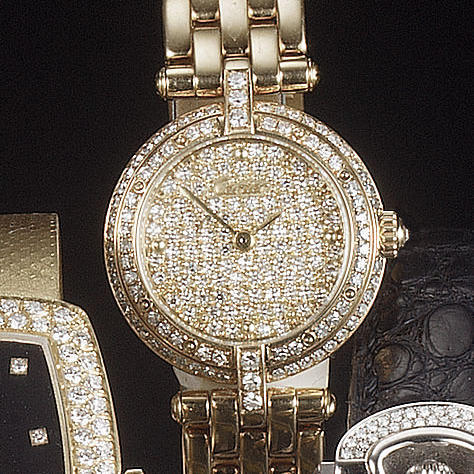 Cartier. A fine 18ct gold and diamond set bracelet watch