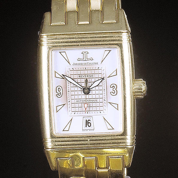 Jaeger le Coultre. A fine 18ct gold reversible bracelet watch