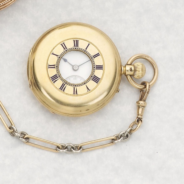 John Cashmore, London. An 18ct gold keyless wind half hunter pocket watch with chain