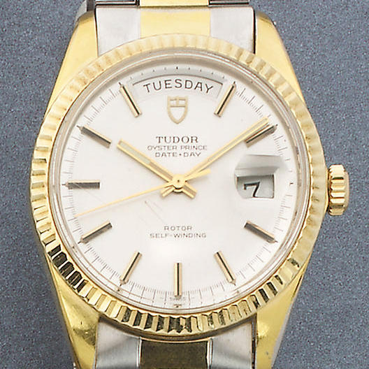 Rolex Tudor. A gents steel & gilt metal automatic bracelet watch with day-date calendar