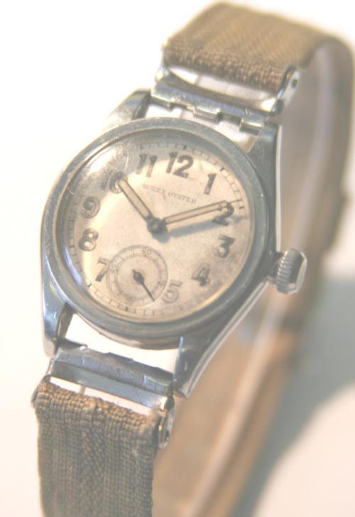 Rolex. A stainless steel mid size wristwatch