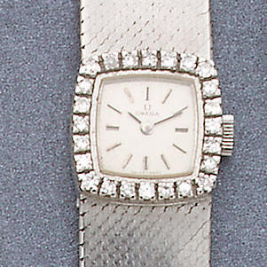 Omega. Lady's 18ct white gold and diamond set bracelet watch