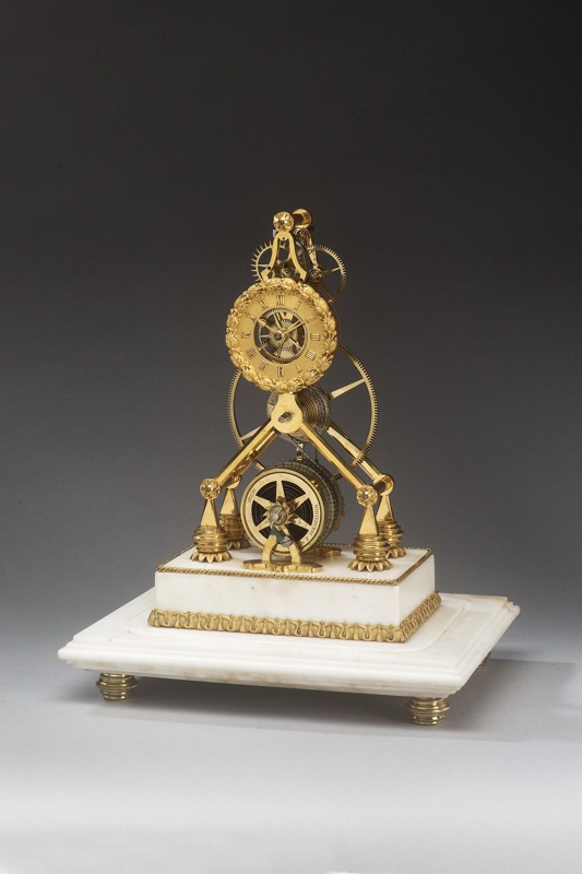 A rare dated, second quarter of the 19th century English gilt bronze skeleton timepiece