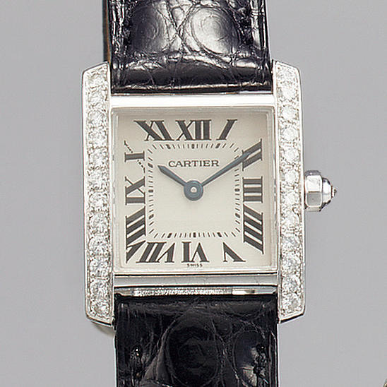 Cartier. A lady's 18ct white gold and diamond set wristwatch