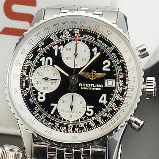 Breitling. A stainless steel automatic chronograph wristwatch together with box & papers