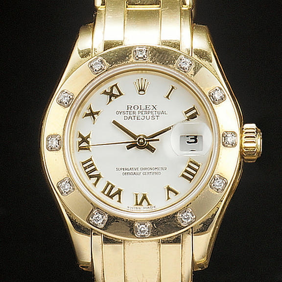 Rolex. A lady's 18ct gold automatic centre seconds calendar bracelet watch