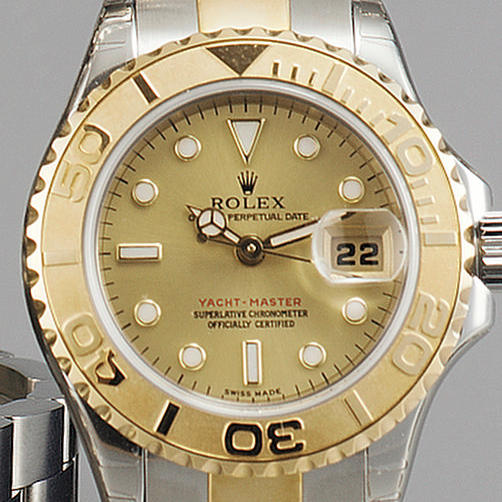 Rolex. A lady's steel and gold automatic centre seconds calendar bracelet watch
