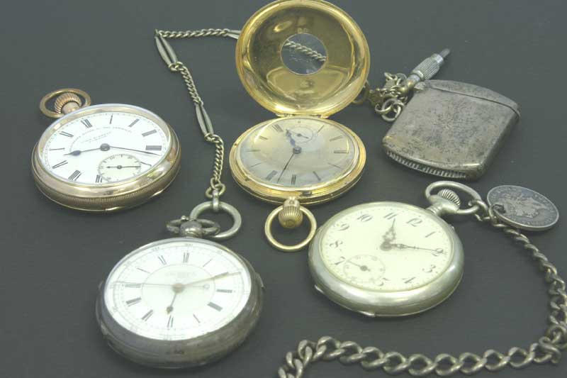 A lot of four pocket watches including an 18ct gold J.W.Benson