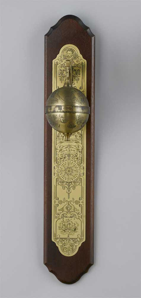 A mahogany, silver and brass falling ball clock made to commemorate the 400th anniversary of Sir Francis Drakes circumnavigation of the globe