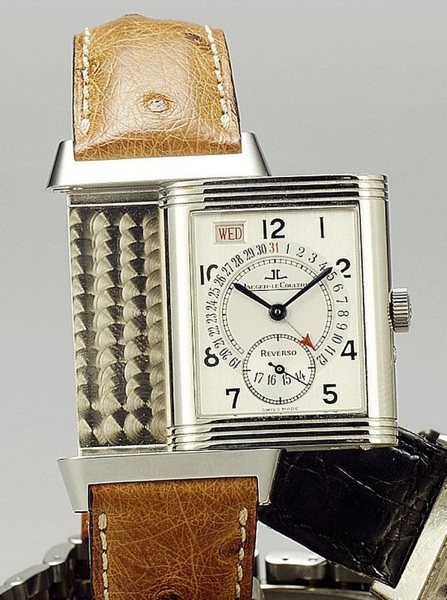 Jaeger Le Coultre. A stainless steel reversible wristwatch with large date and fitted box