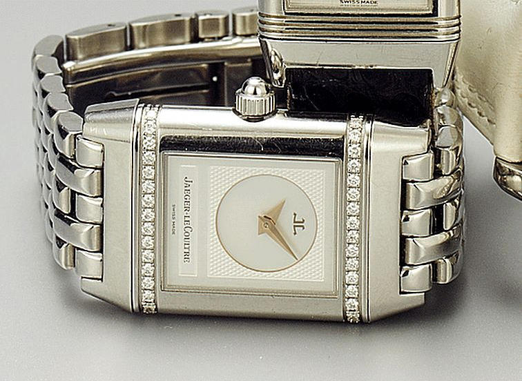 Jaeger Le Coultre. A stainless steel and diamond set dual dial reversible bracelet watch
