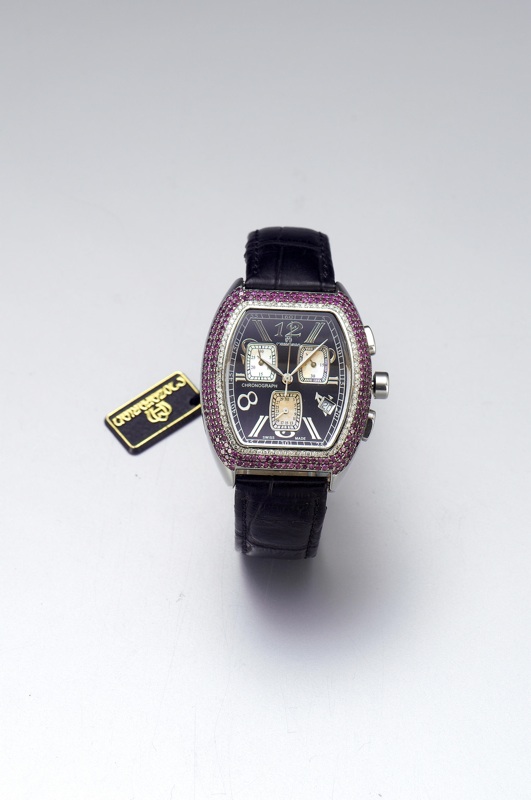 Mozafarian. An oversize stainless steel diamond and ruby set quartz calendar chronograph wristwatch