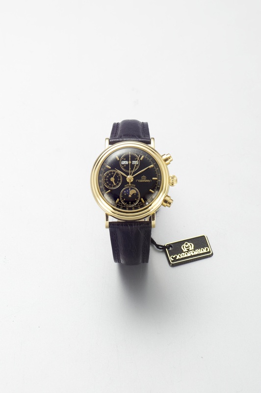 Mozafarian. An 18ct gold automatic day-date chronograph wristwatch with lunar and 24hr indicators