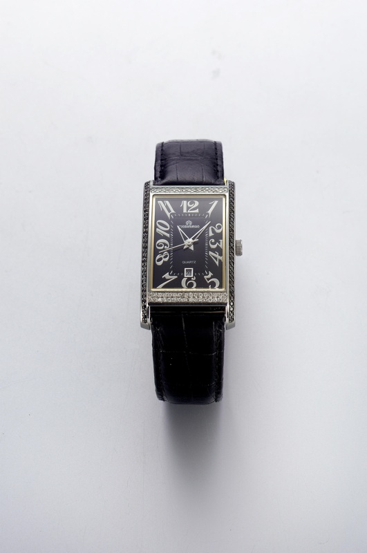 Mozafarian. A stainless steel, diamond and black diamond rectangular quartz calendar wristwatch