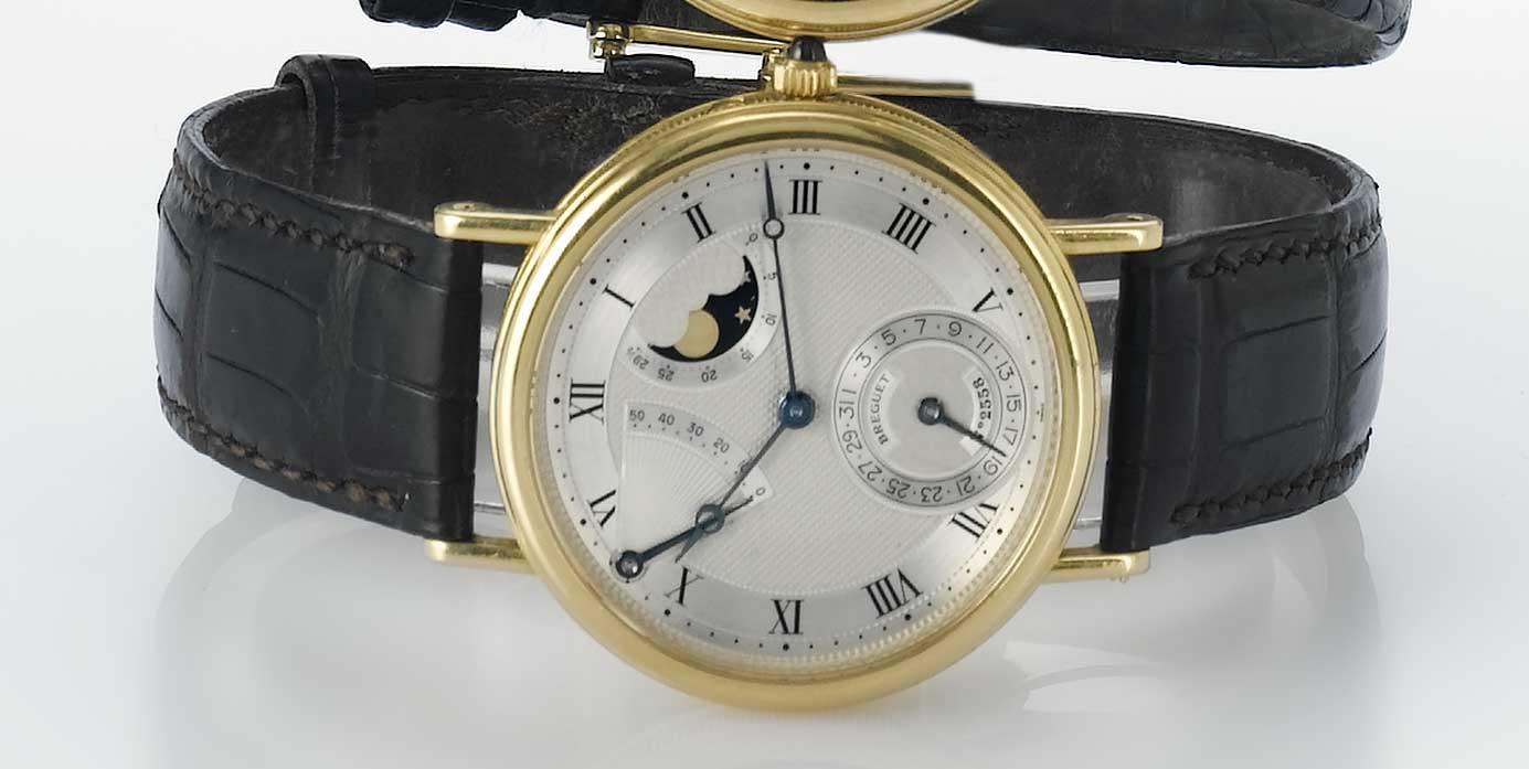 Breguet. A fine 18ct gold automatic wristwatch with calendar phases of moon and power reserve