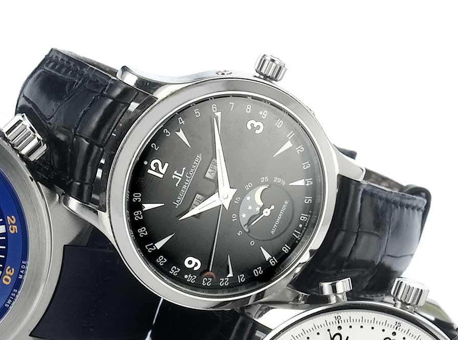 Jaegar Le Coultre. A stainless steel automatic wristwatch with triple date and moon phases