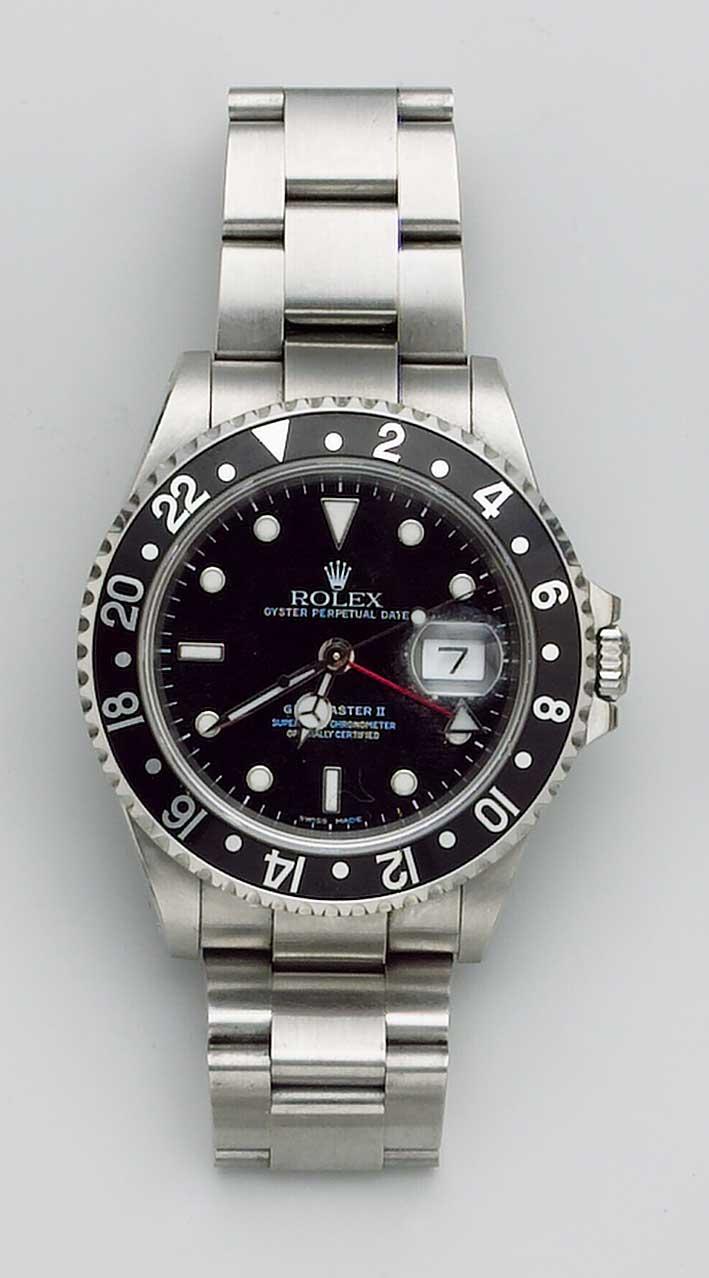 Rolex. A stainless steel automatic 24-hour calendar watch