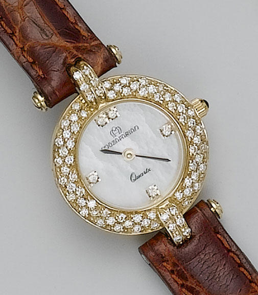 Mozafarian. A lady's 18ct gold diamond set bracelet watch