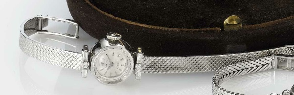 Rolex. An 18ct white gold and diamond set bracelet watch