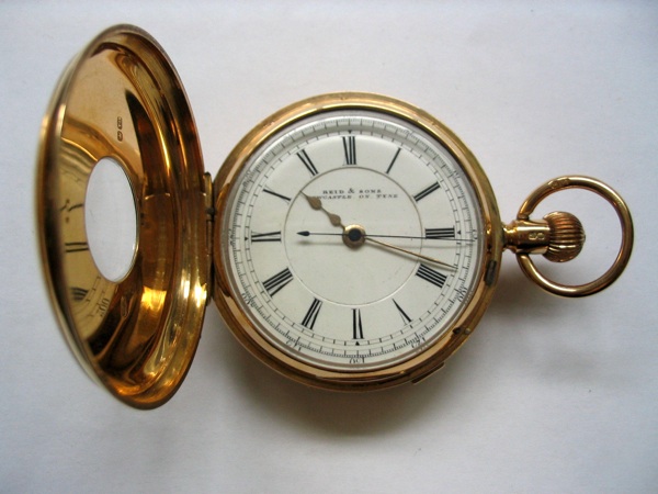 Reid and Sons. An 18ct gold centre seconds pocket watch