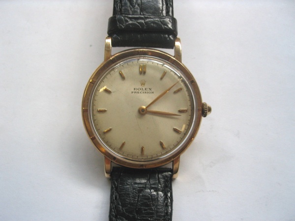 Rolex. A gents 9ct gold centre seconds wristwatch