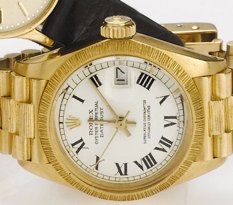 Rolex. A lady's 18ct gold centre seconds calendar bracelet watch