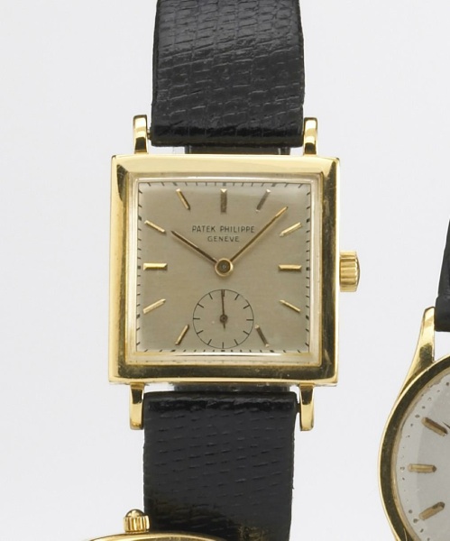 Patek Philippe. An 18k gold square cased wristwatch