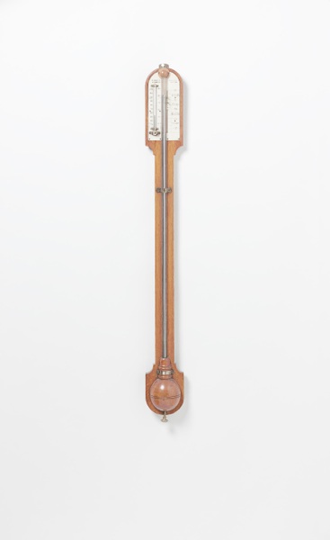 An early 20th century oak stick barometer