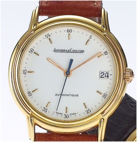 Jaeger le Coultre. An 18ct gold centre seconds calendar wristwatch