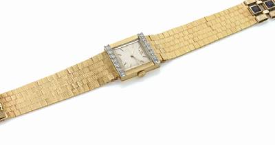 Jager LeCoultre. A square 18k gold and diamond set bracelet watch