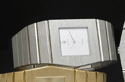 Rolex. A fine and unusual 18k white gold left-handed asymmetrical bracelet watch