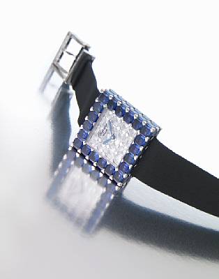 Chopard by DeGrisogono. An exquisite Lady's 18k white gold, emerald-cut sapphire and diamond set square quartz wristwatch with pav