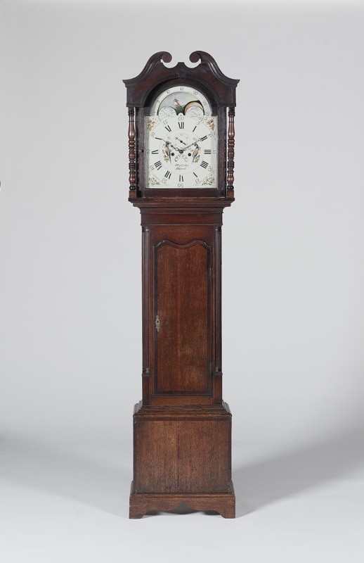 An early 19th century oak longcase clock with Wilson dial