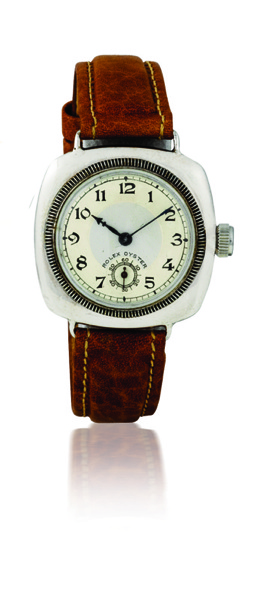 Rolex. A chrome cushion cased wristwatch