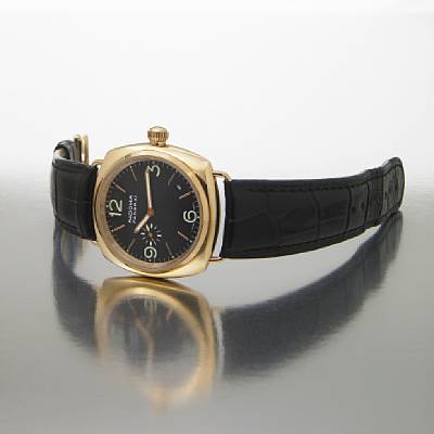 Officine Panerai. A large 18k rose gold limited edition self-winding cushion cased wristwatch with calendar