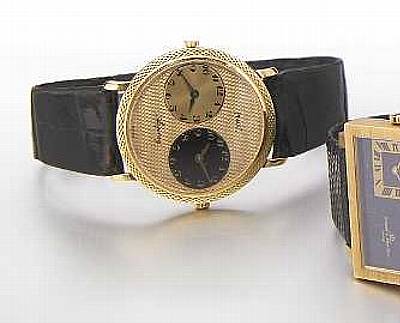 Piaget, retailed by Asprey, London. A fine 18k gold dual time-zone wristwatch with independent movements and dials