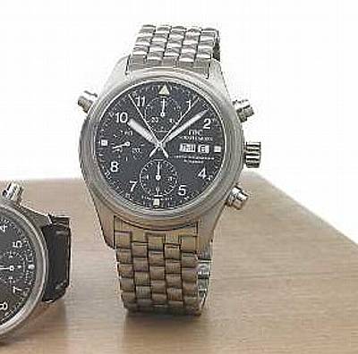 International Watch Co., Schaffhausen. A large stainless steel self-winding anti-magnetic split-second chronograph wristwatch with day-date calendar on a stainless steel IWC bracelet